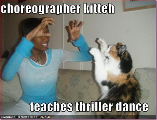 funny-pictures-choreographer-cat-teaches-thriller-dance