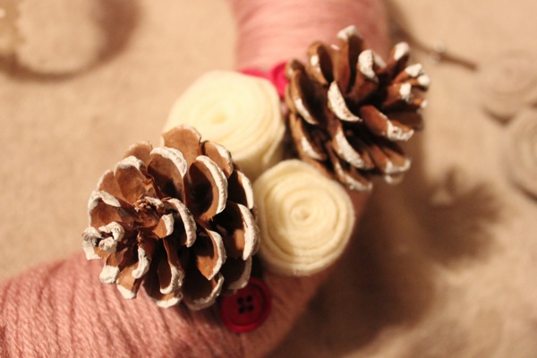 pinecone and felt flower wreath decorations