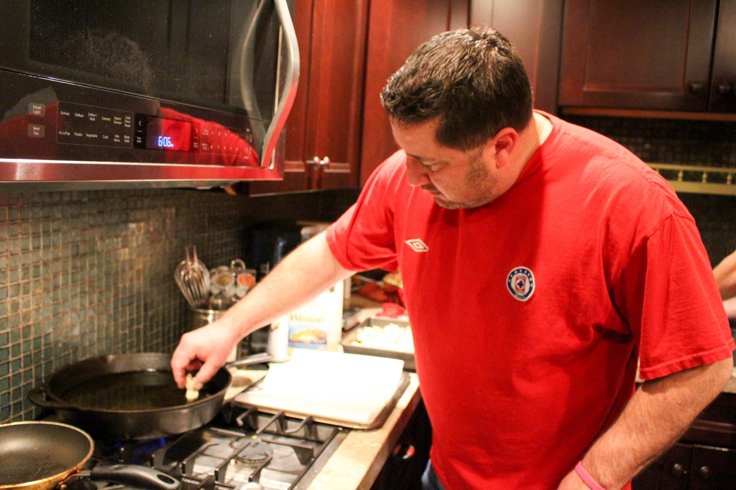 Uncle E frying crab puffs