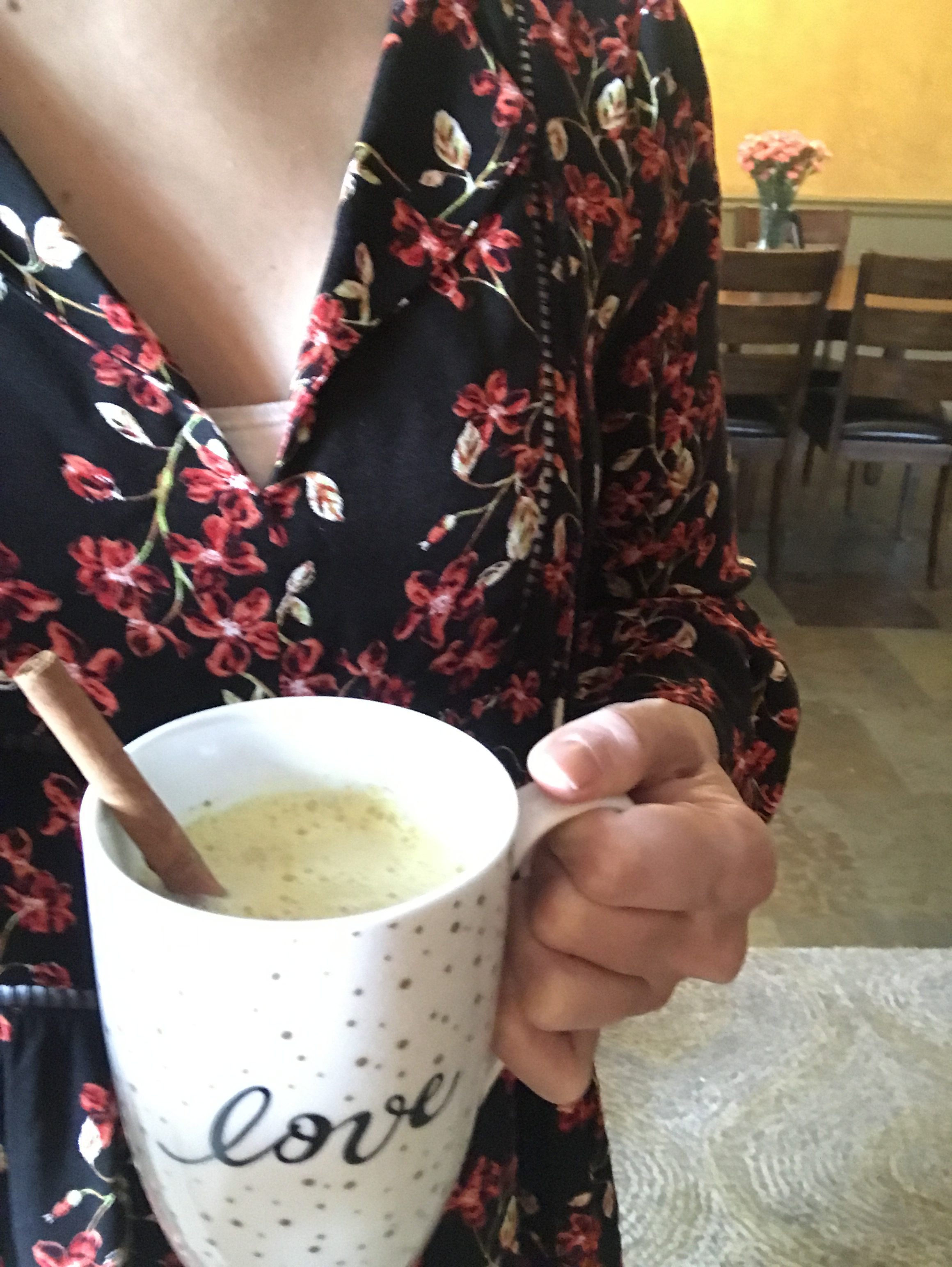 me with a mug of turmeric tea