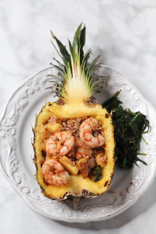 Shrimp and rice in pineapple boat