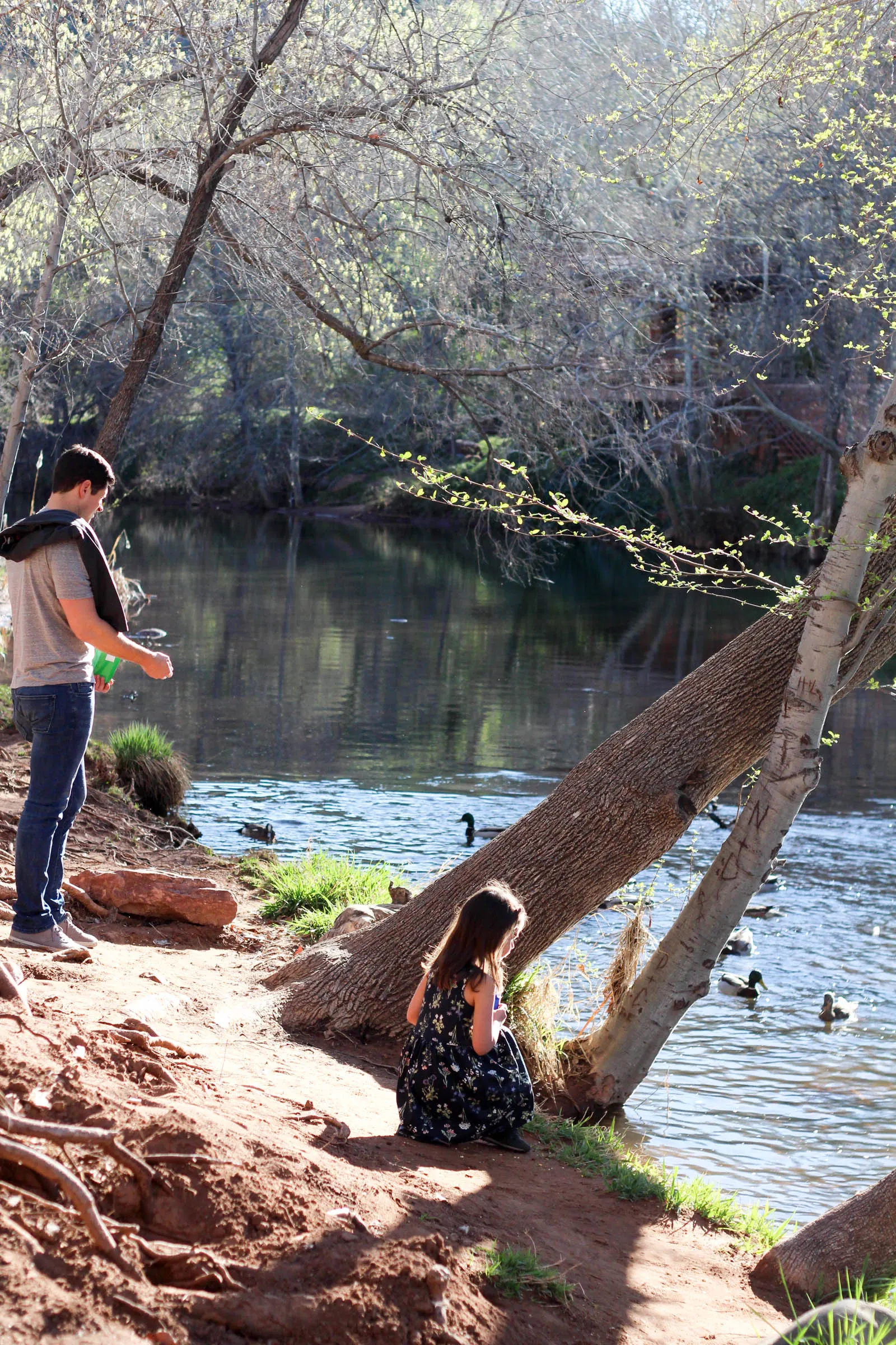 Tom and Liv feeding ducks at L’Auberge de Sedona