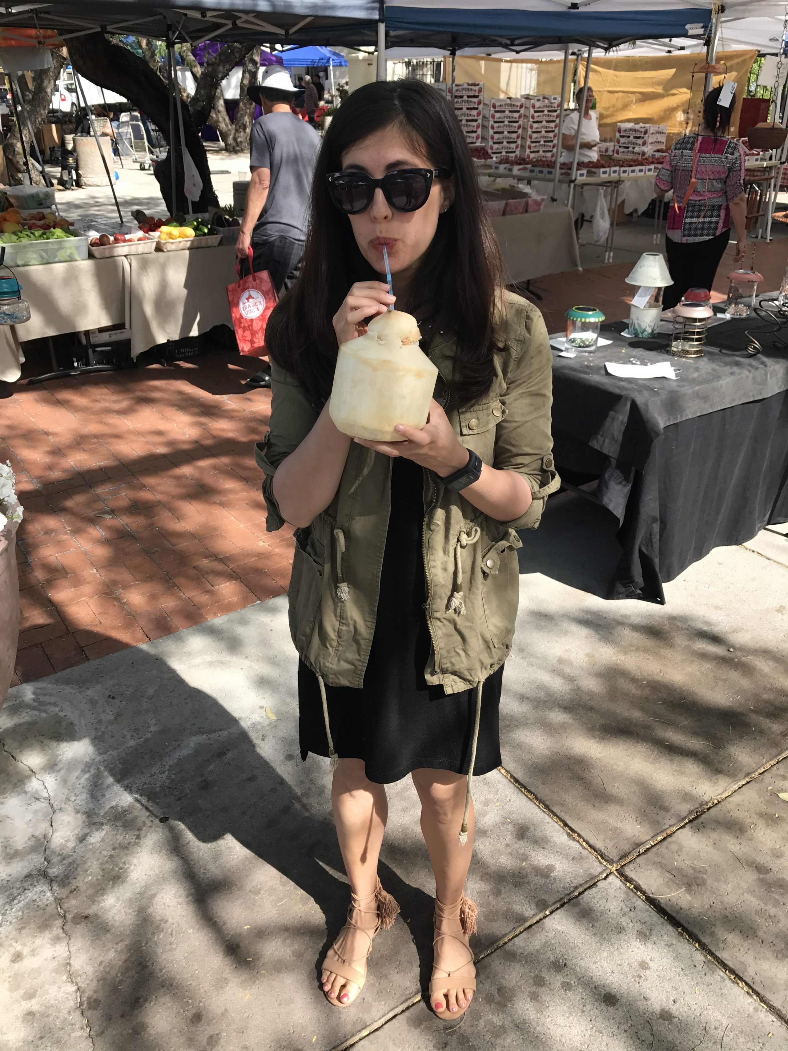 drinking from a coconut