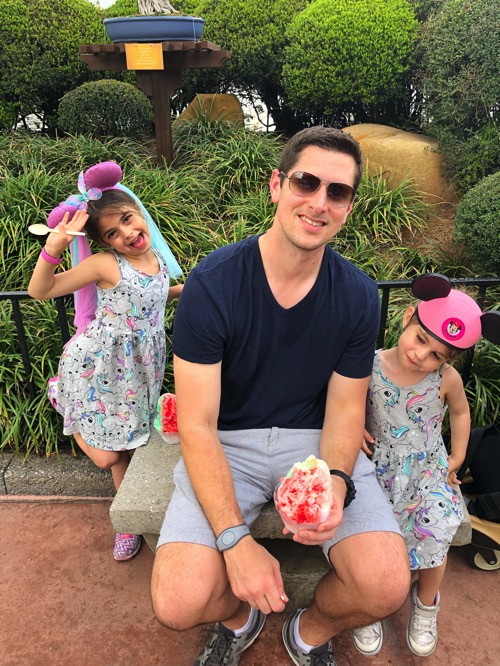 Eating snow cones at Epcot