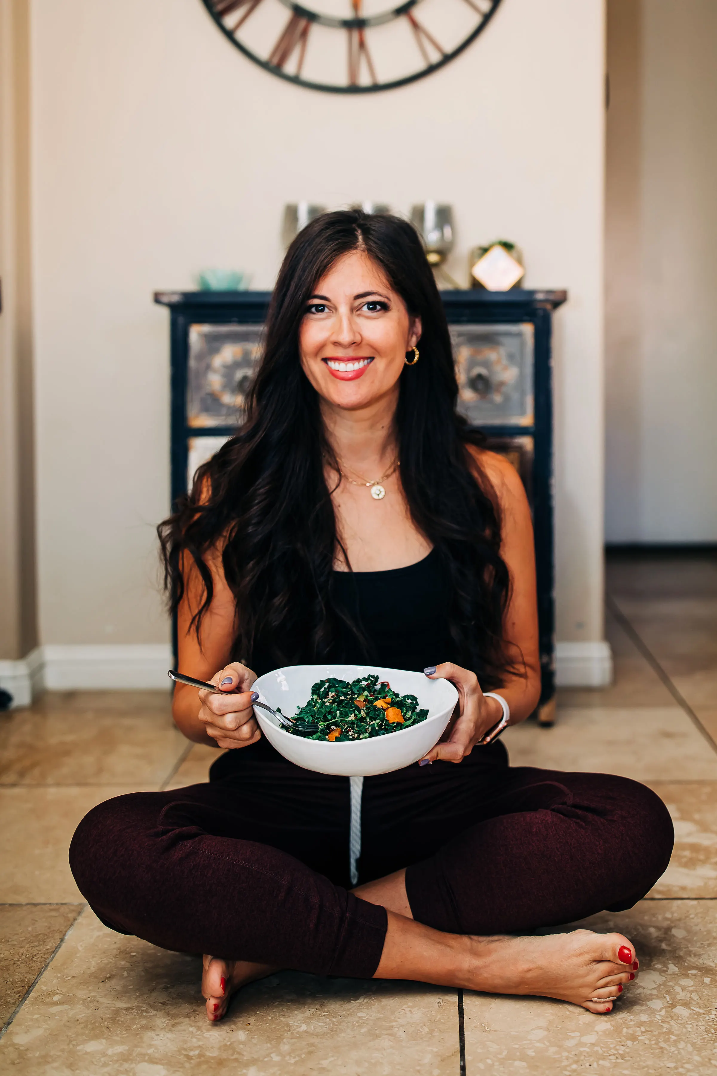 woman holding a bowl of salad