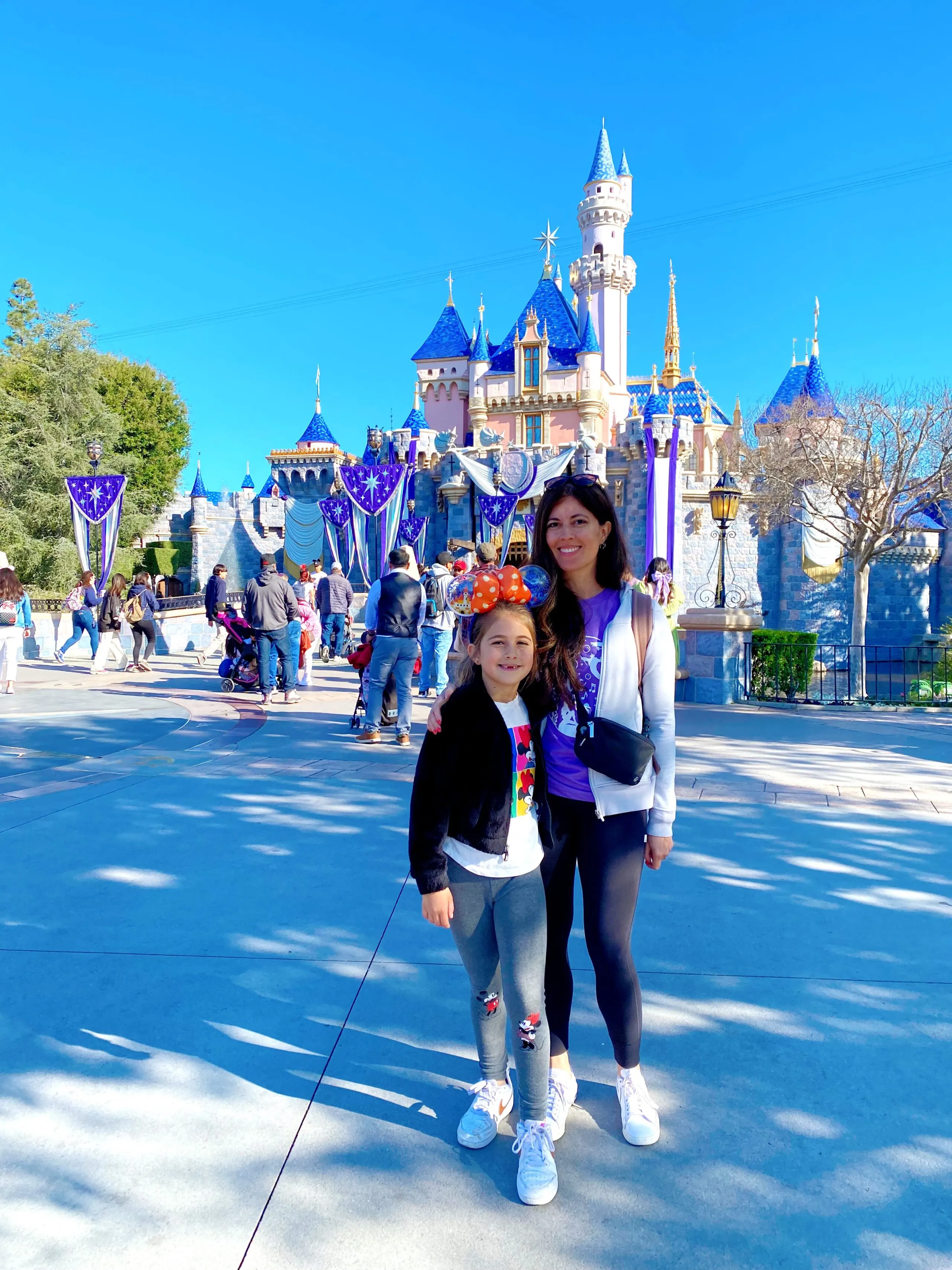 mom and daughter in Disneyland