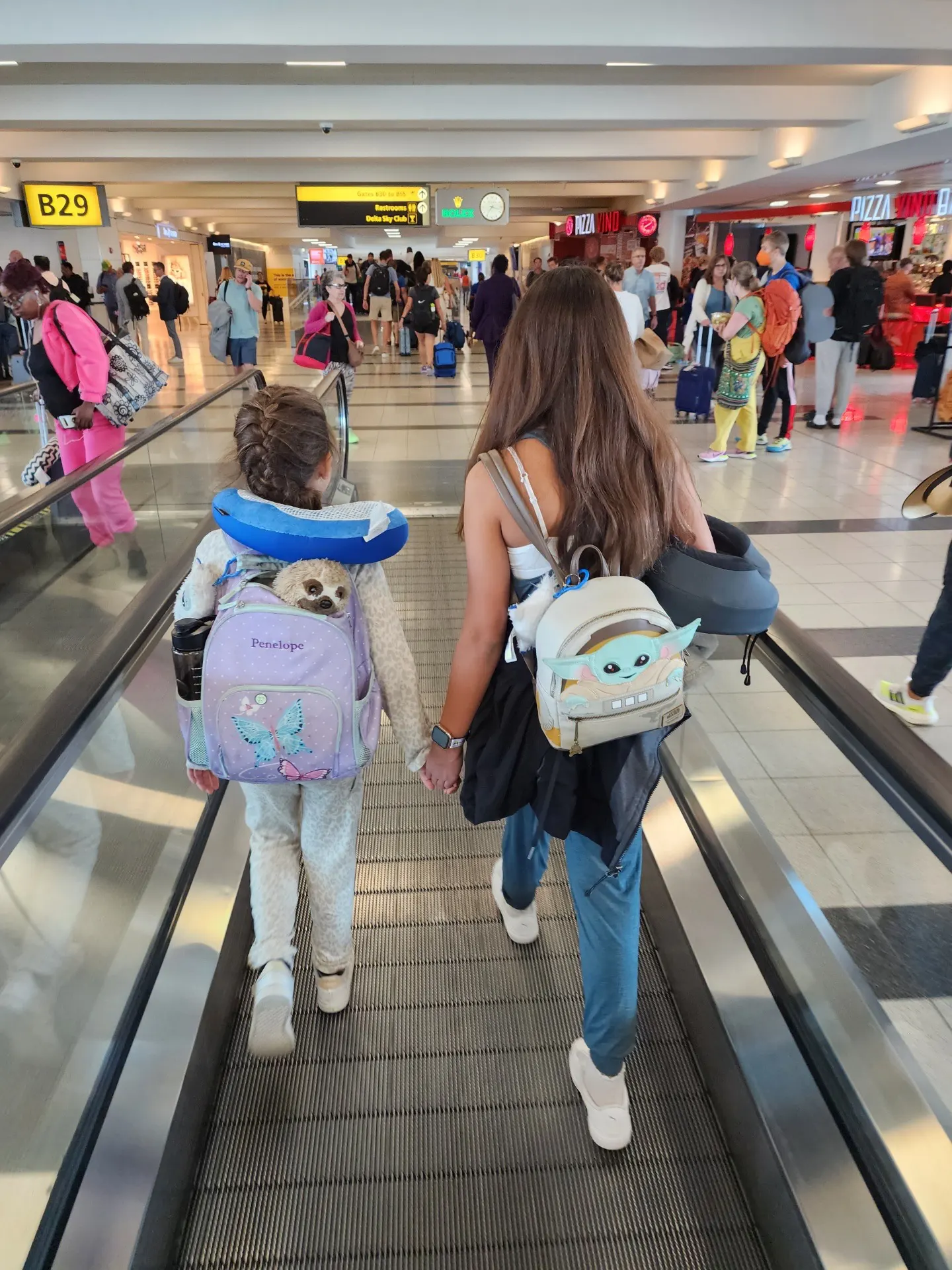 little girls at the airport