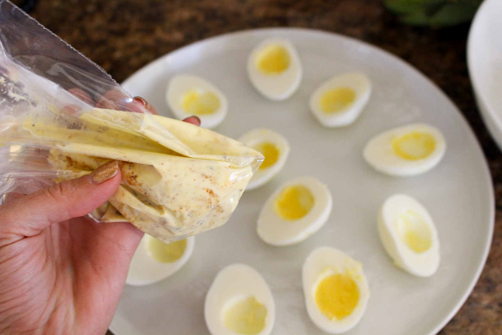 Pulled BBQ Chicken Deviled Eggs - The Fitnessista